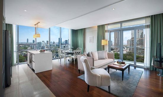 Separate living and dining room in Three Bedroom Suite