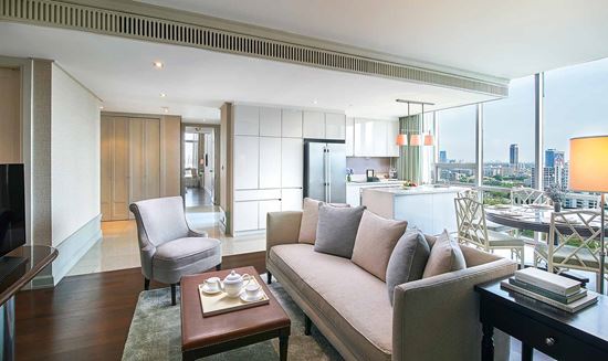 Separate living and dining room in Three Bedroom Suite